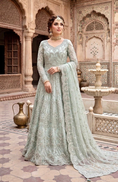 Pakistani bridal pishwas (long gown) in a delicate mint green
